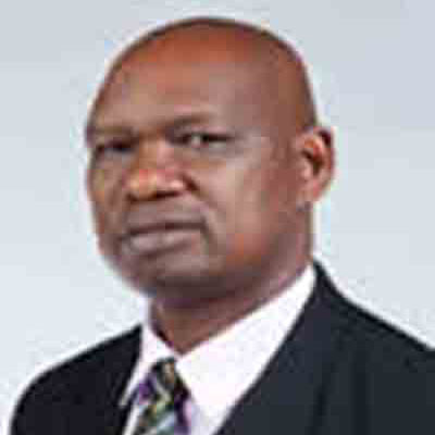 Dr. Thomas  Ekamais Akuja