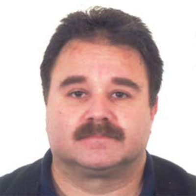 Dr. Alexis  Conides