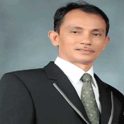Dr. Haripin Togap Sinaga